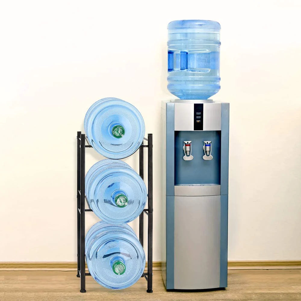 Stainless steel heavy duty water bottle stand is kept near a hot and cold water dispenser